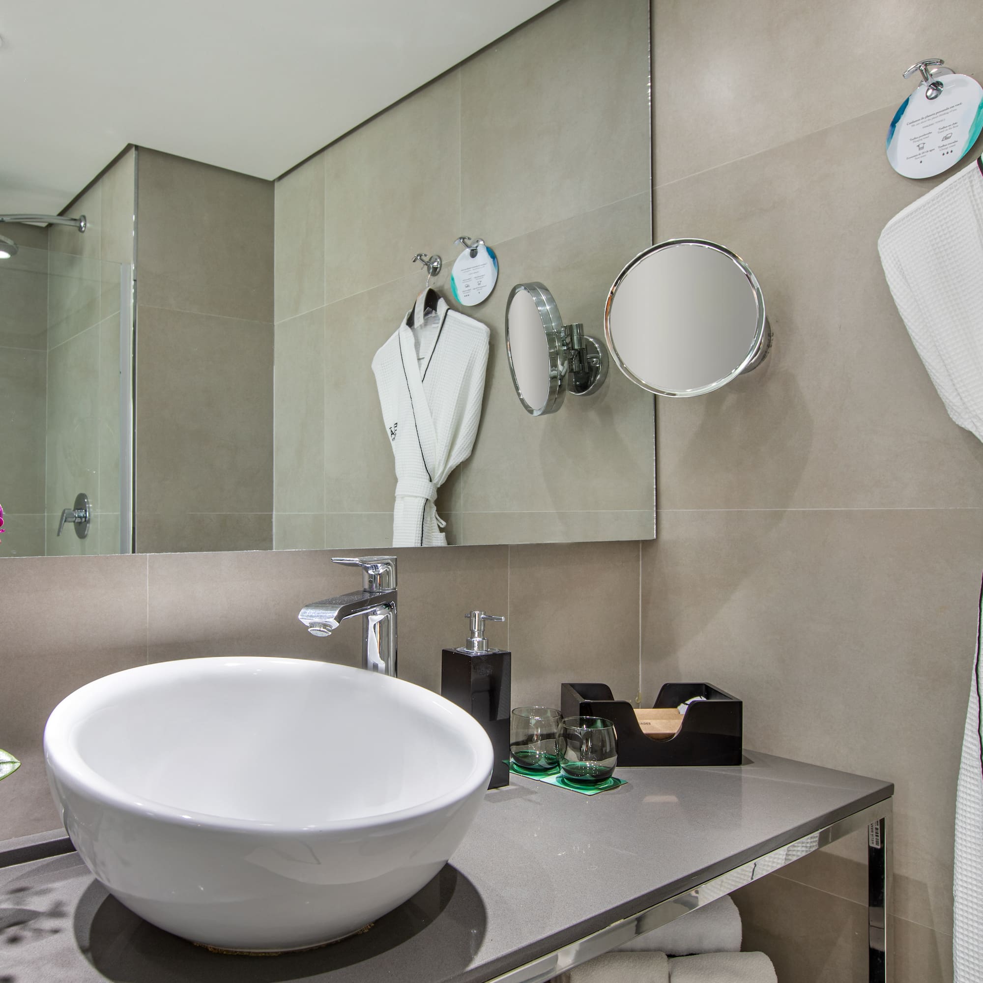 a bathroom with a sink and towels