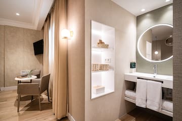 a room with a mirror and a table