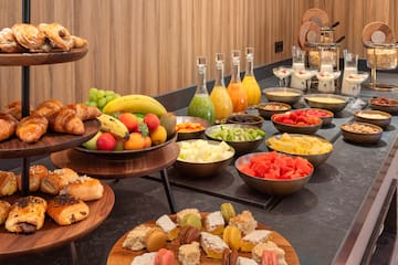 a buffet table with different foods