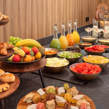 a buffet table with different foods