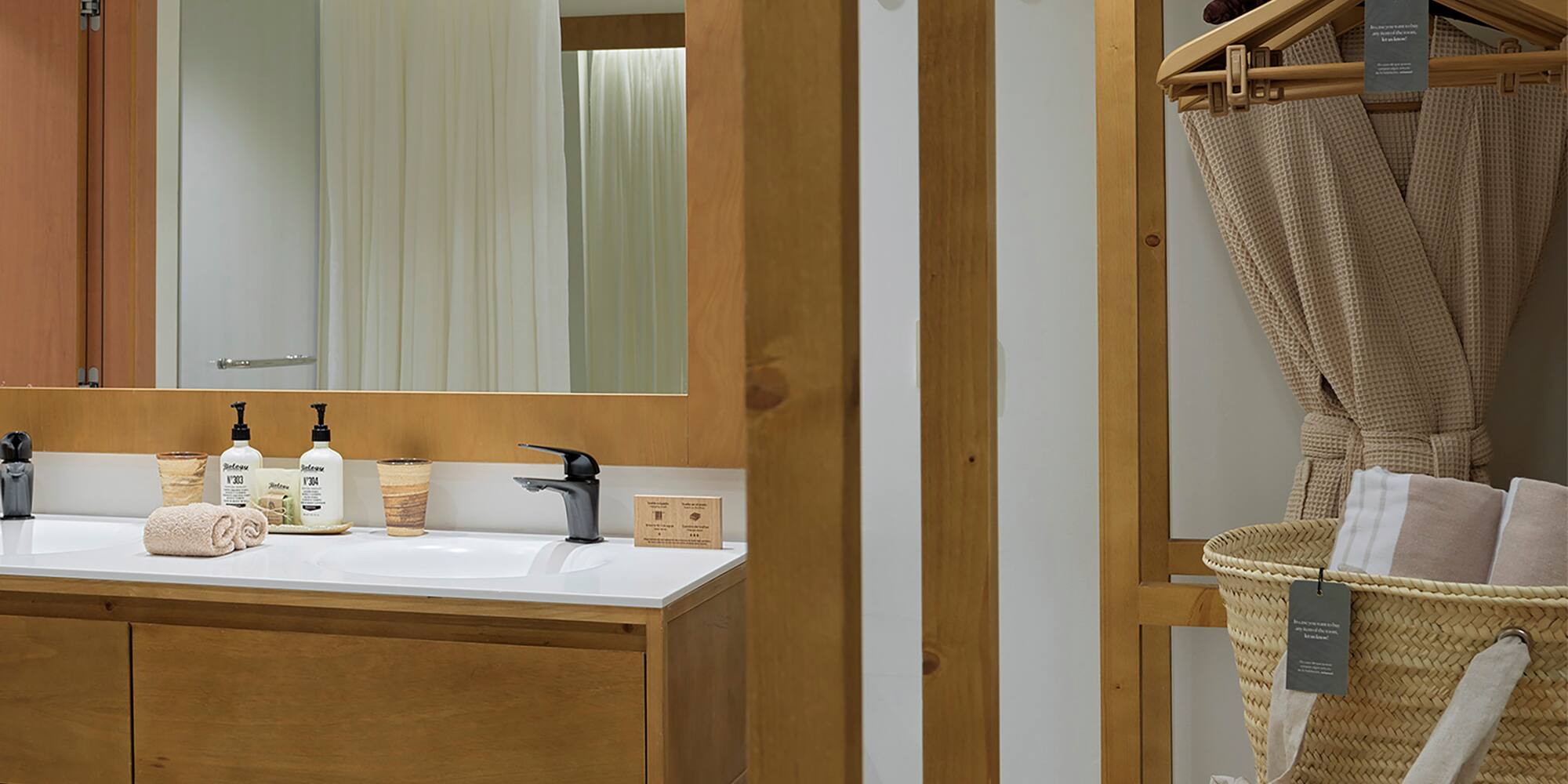 a bathroom with a mirror and sink