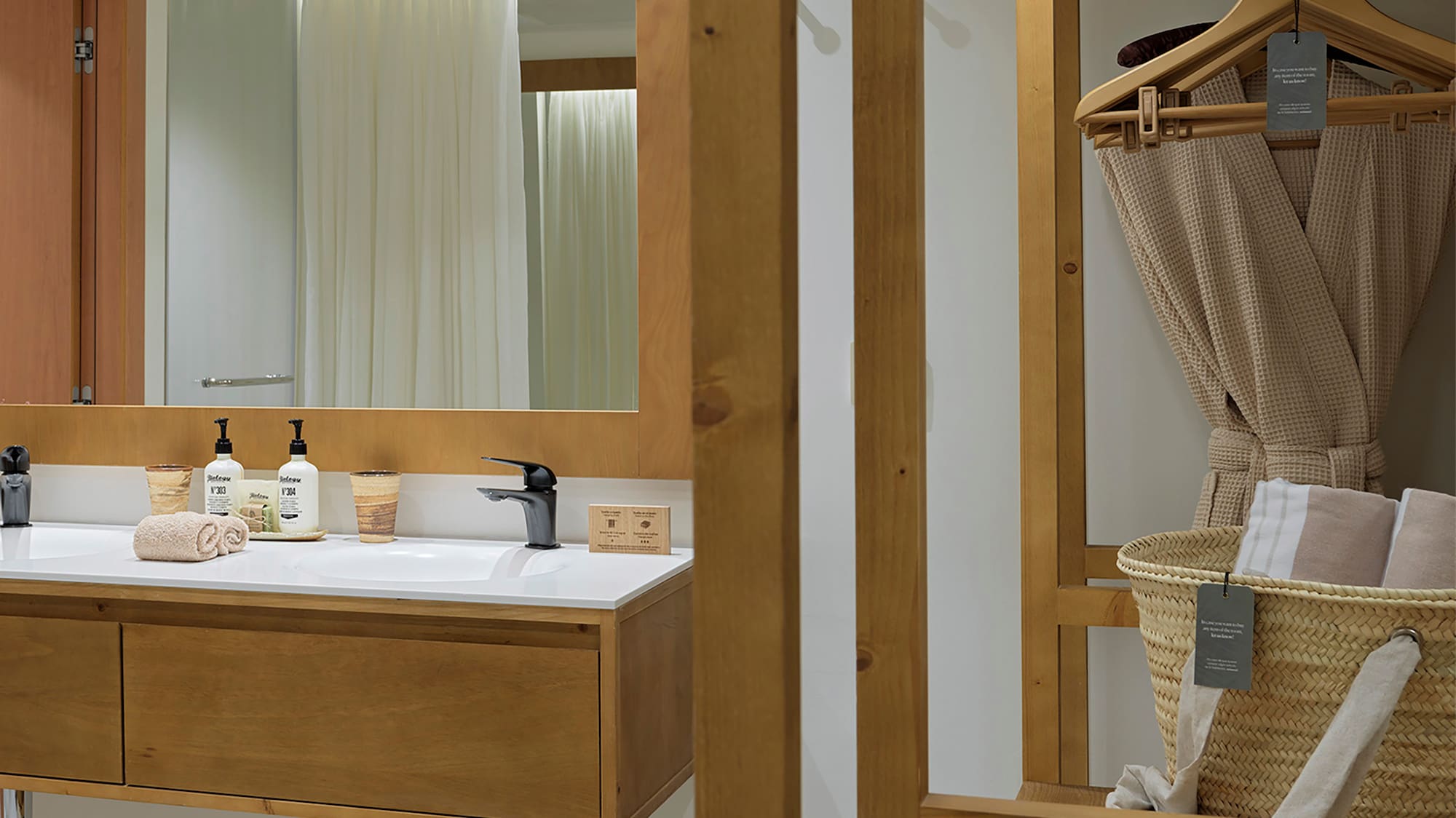 a bathroom with a mirror and sink