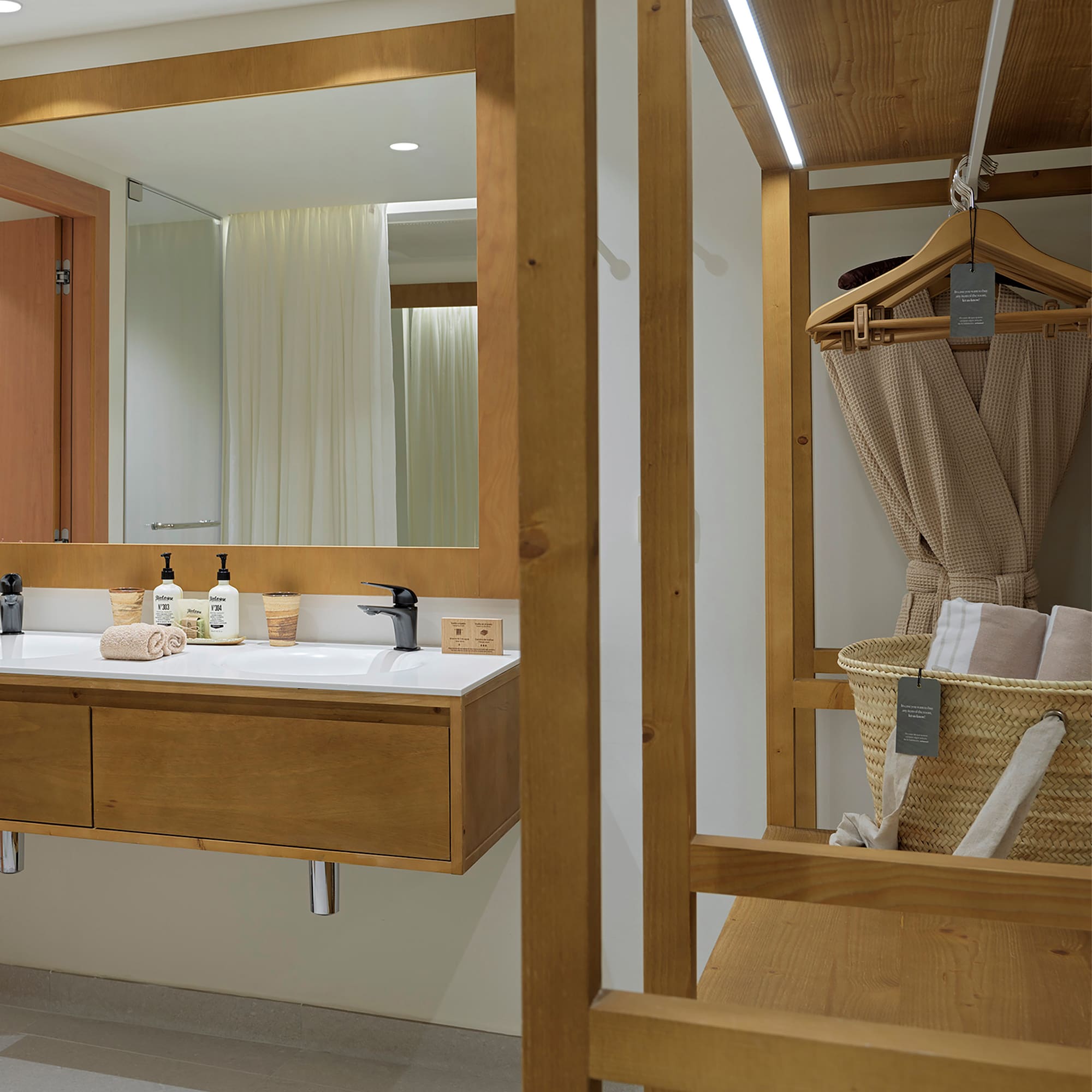 a bathroom with a mirror and sink