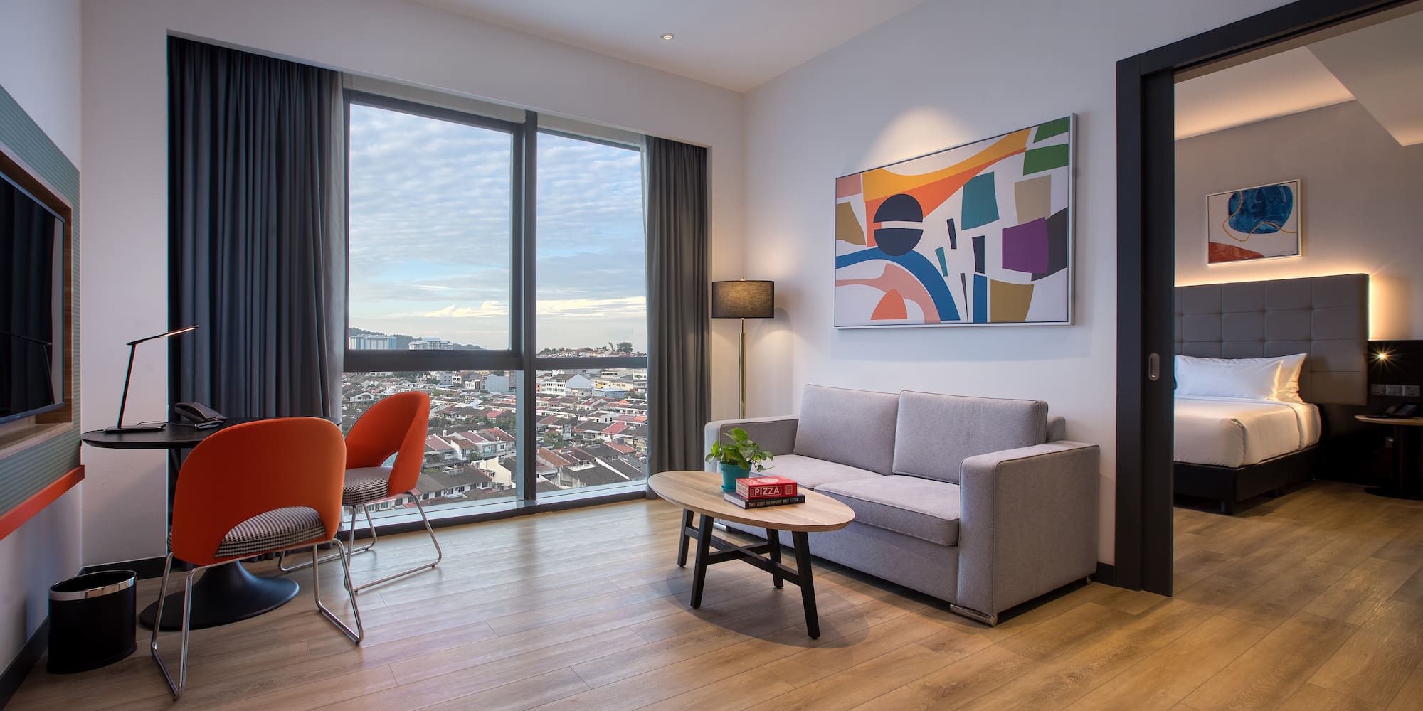 a living room with a couch and a table