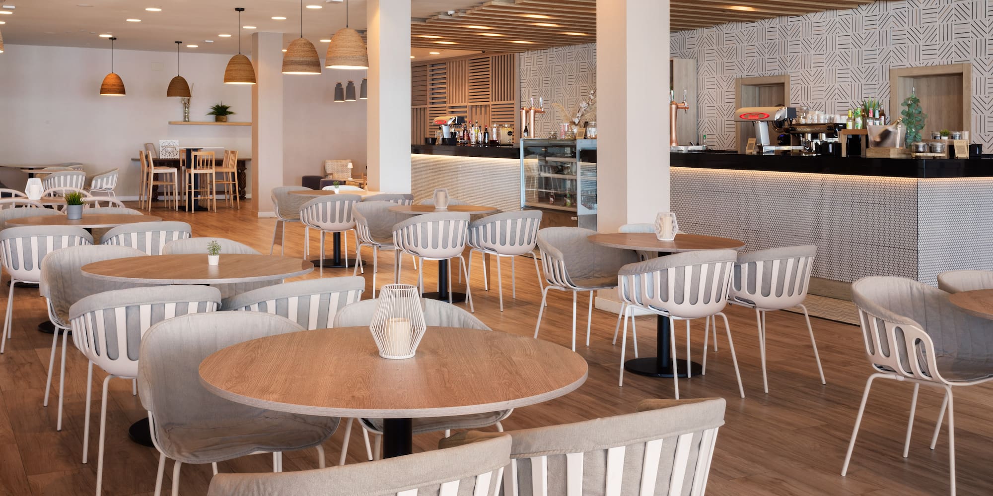 a restaurant with tables and chairs