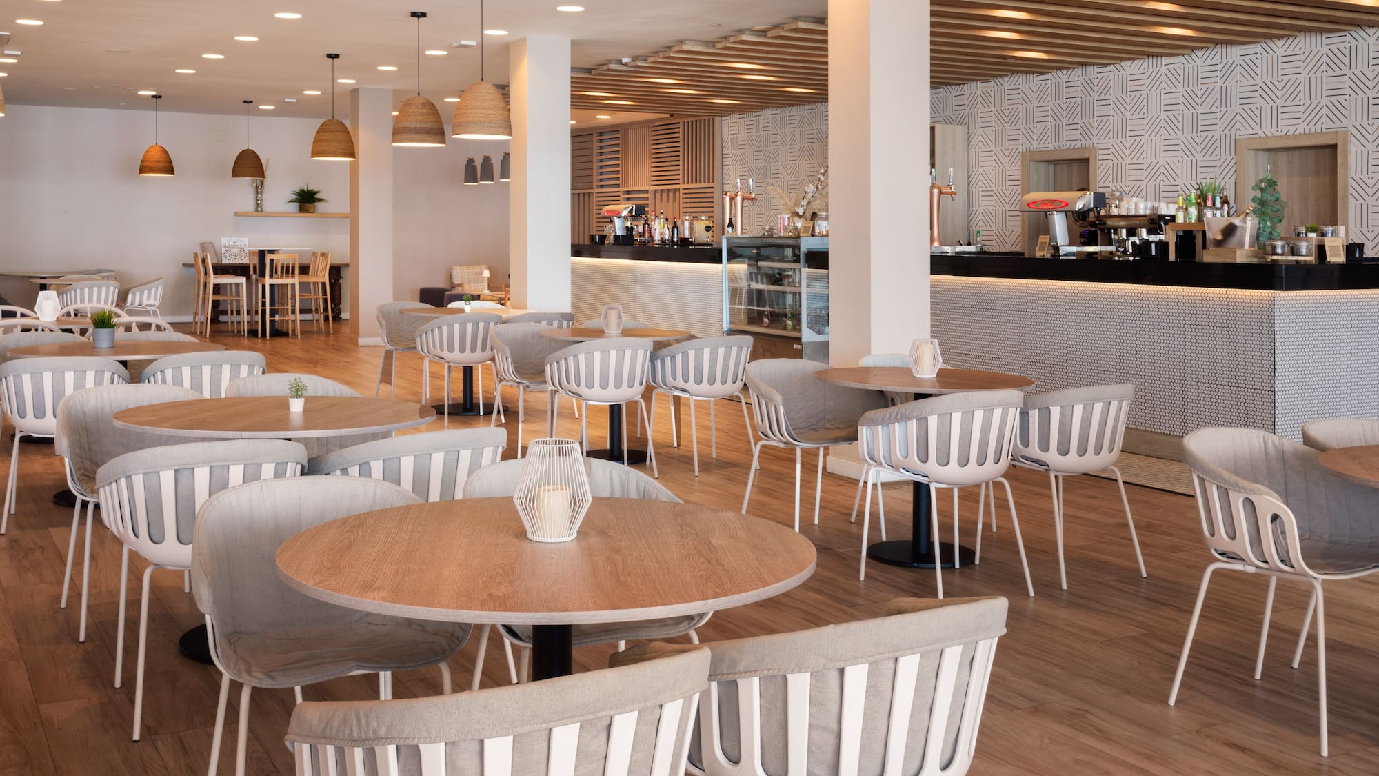 a restaurant with tables and chairs