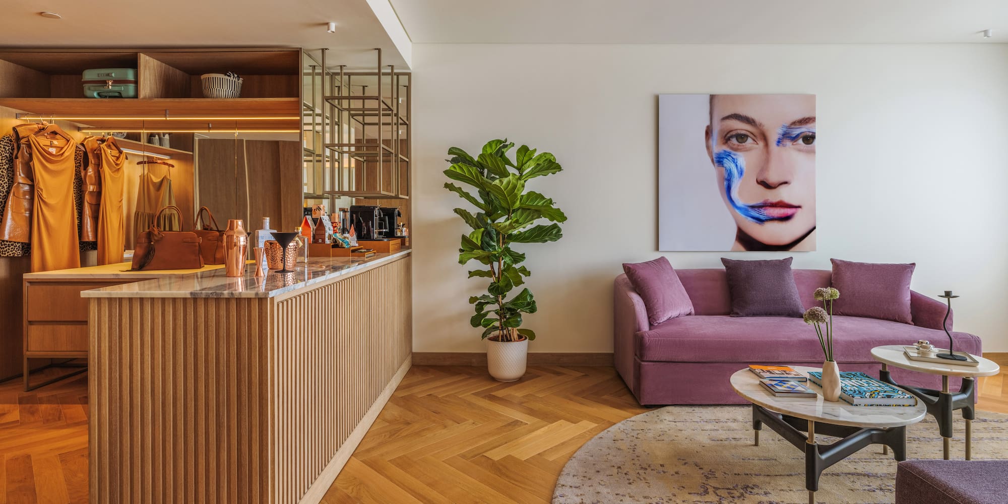 a living room with a couch and a bar