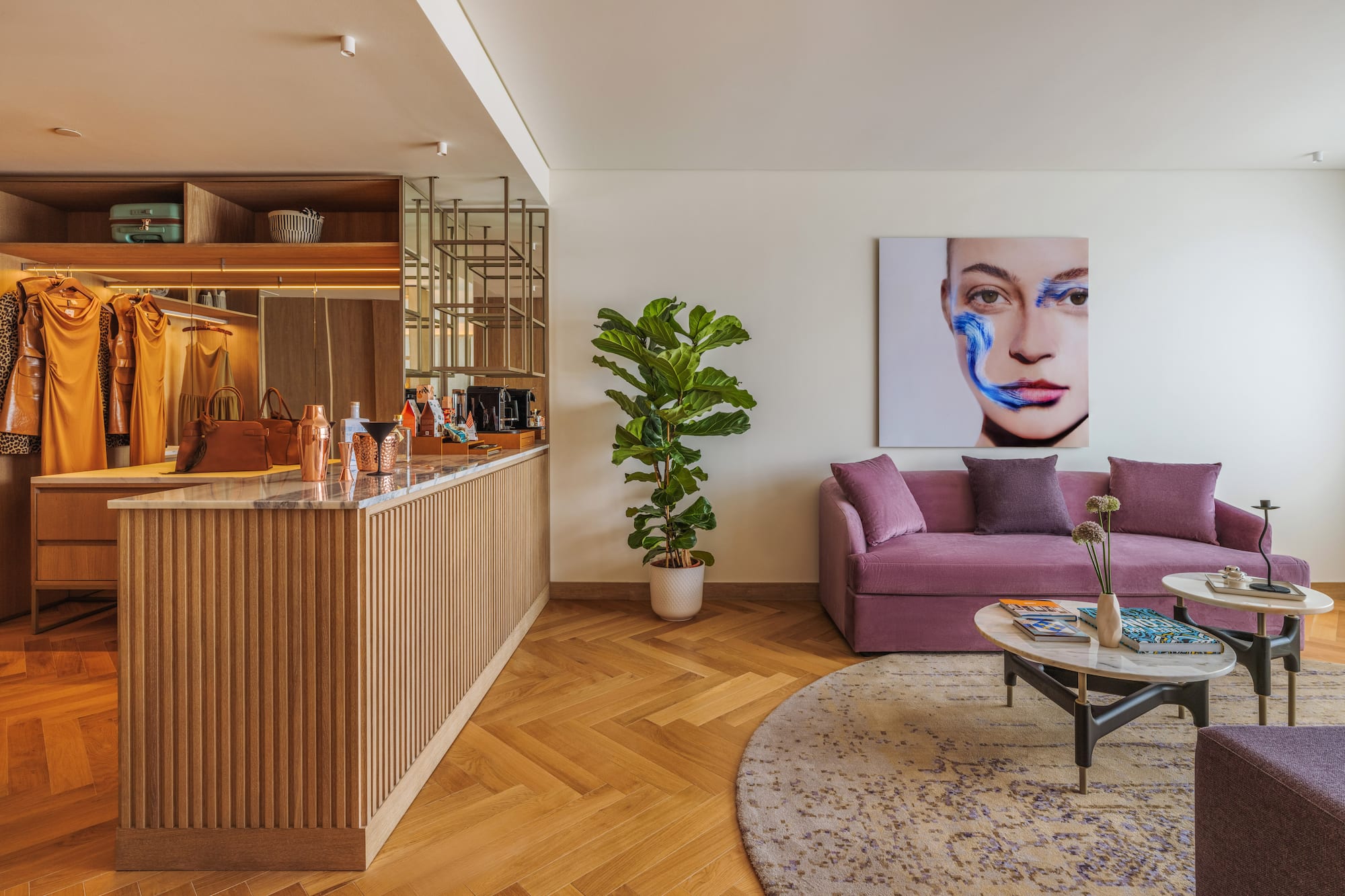 a living room with a couch and a bar