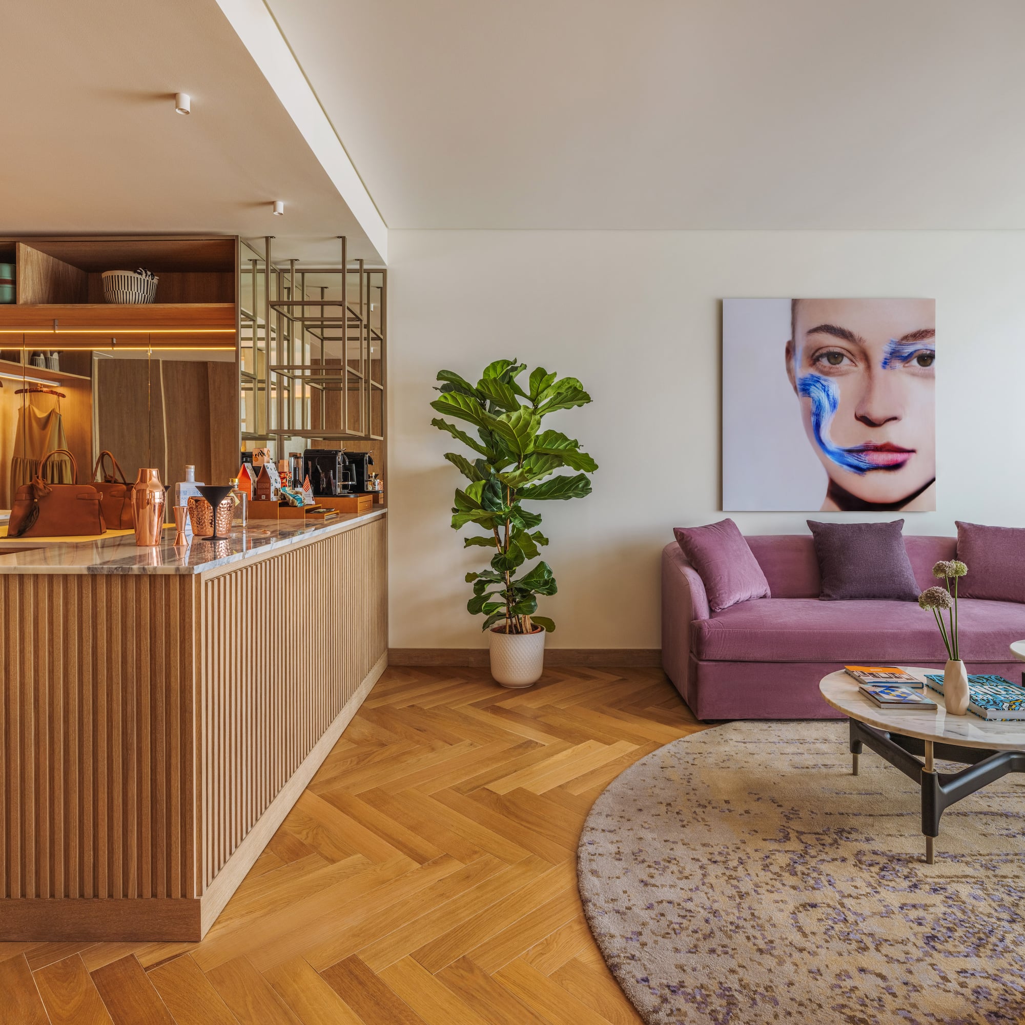 a living room with a couch and a bar