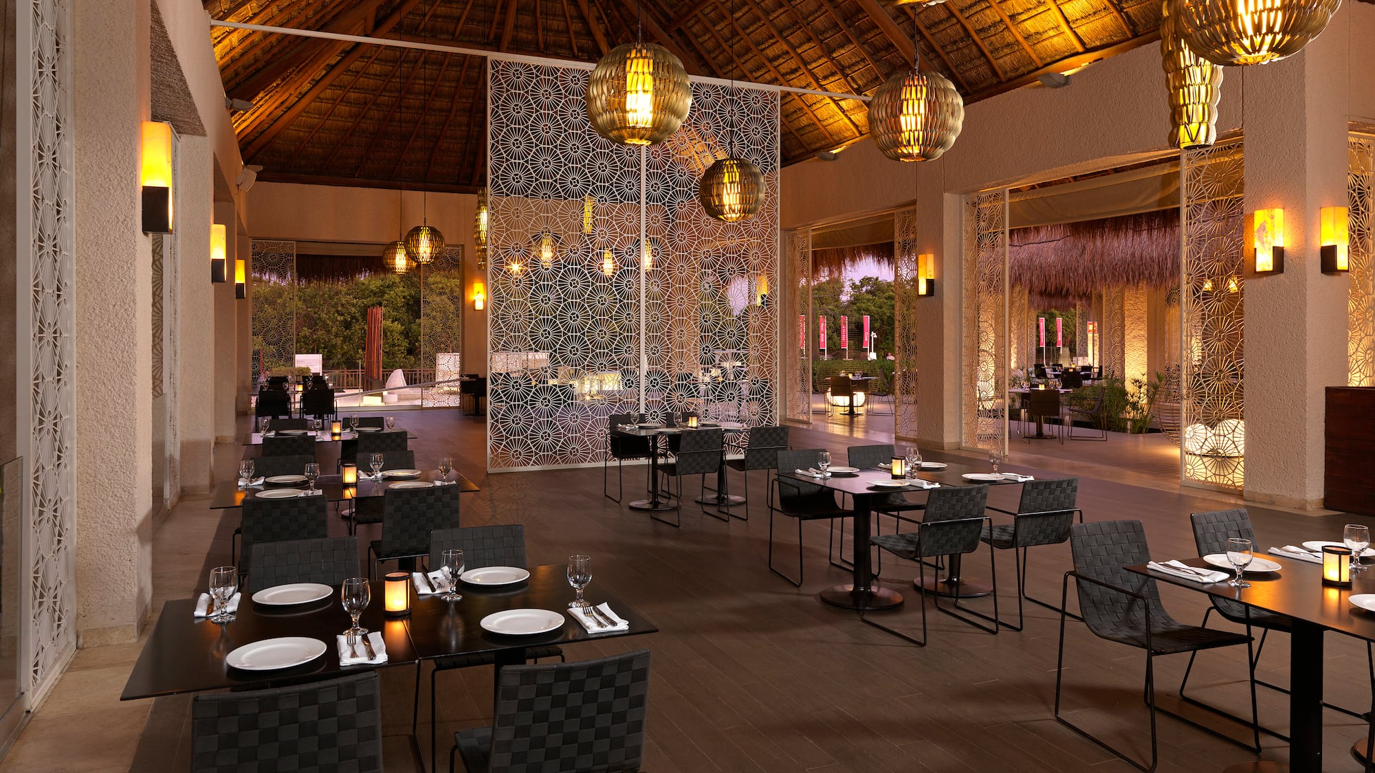 a restaurant with tables and chairs