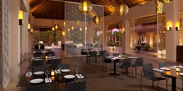 a restaurant with tables and chairs