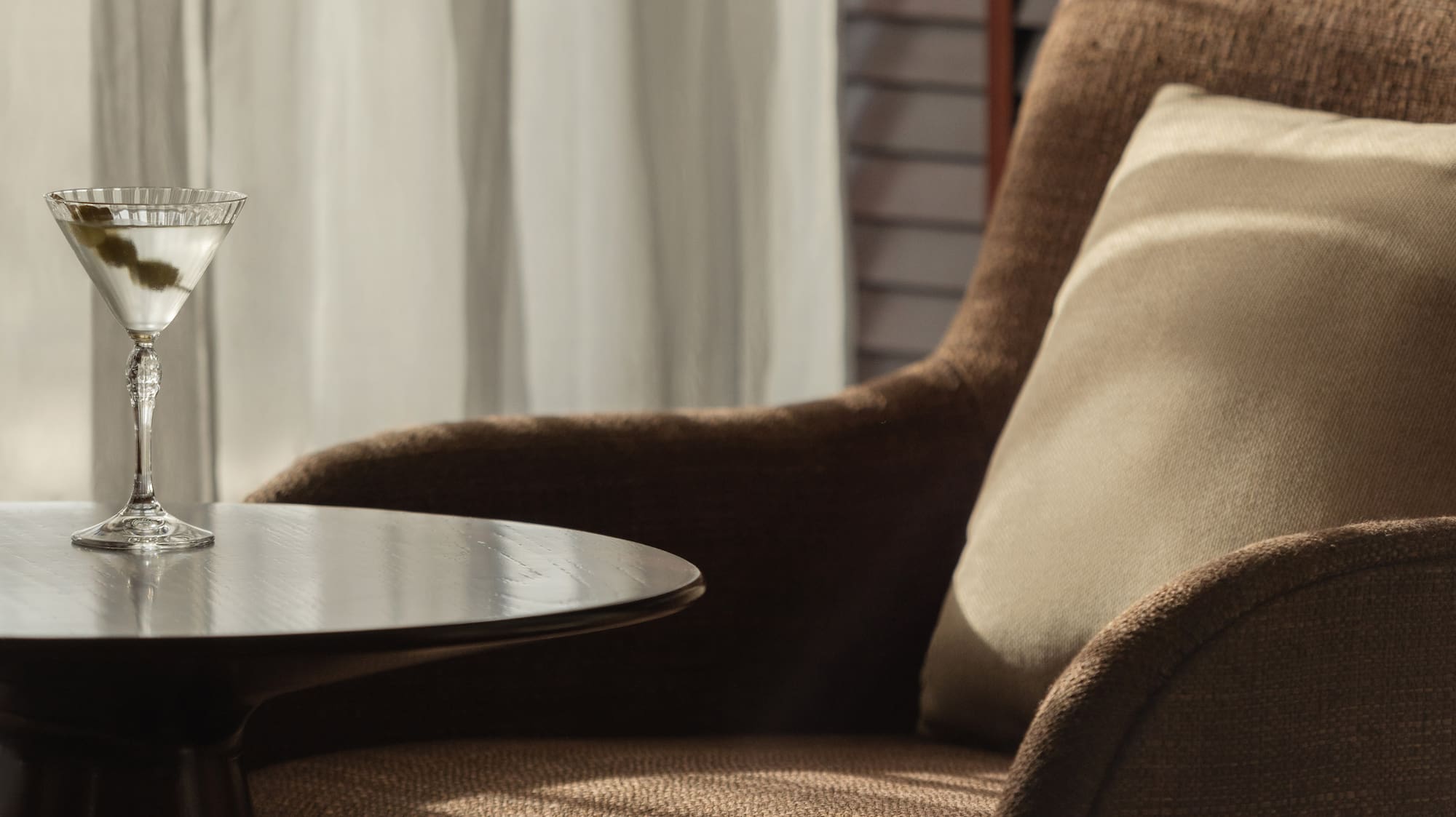 a martini glass on a table