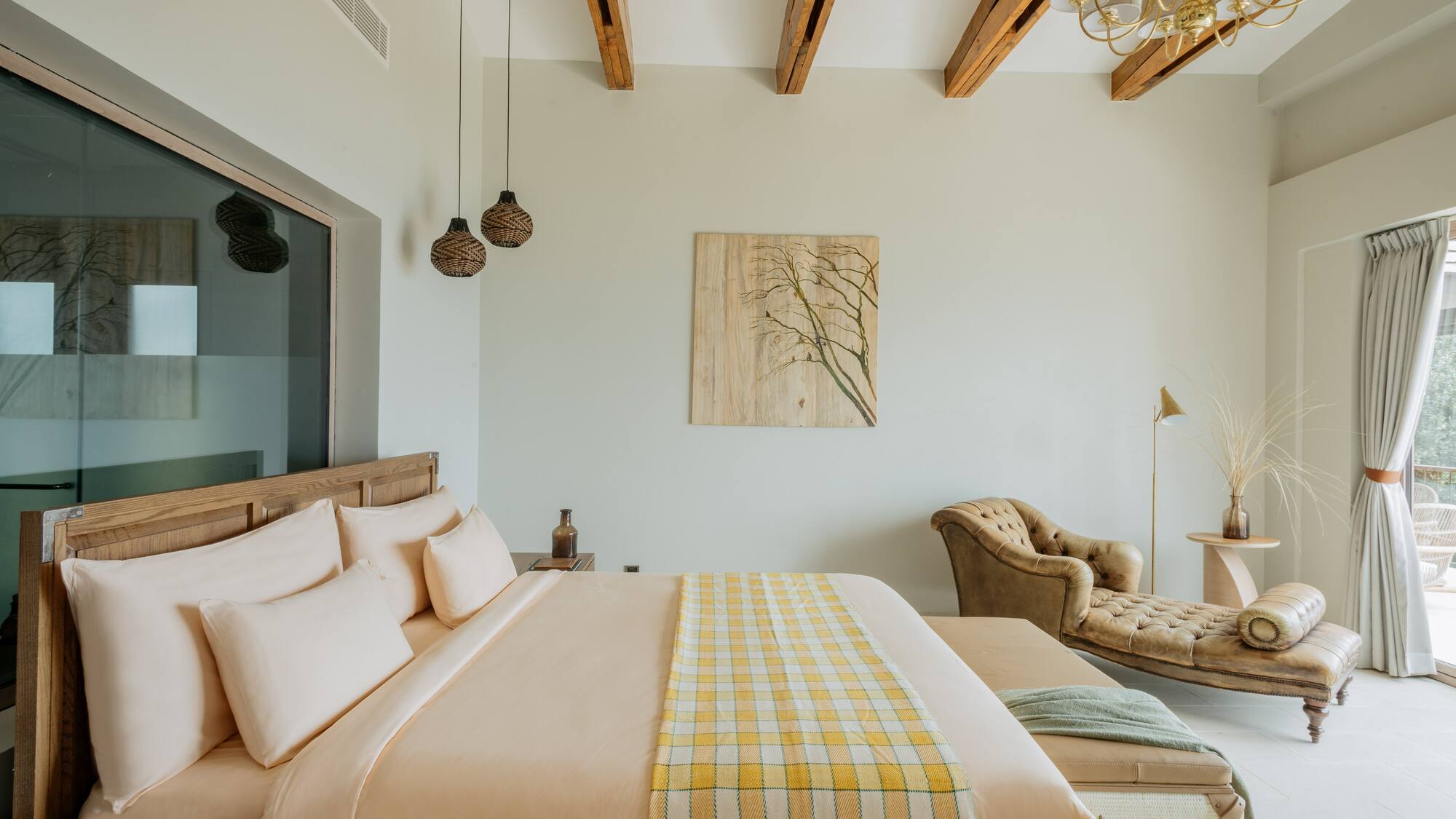 a bedroom with a bed and a couch