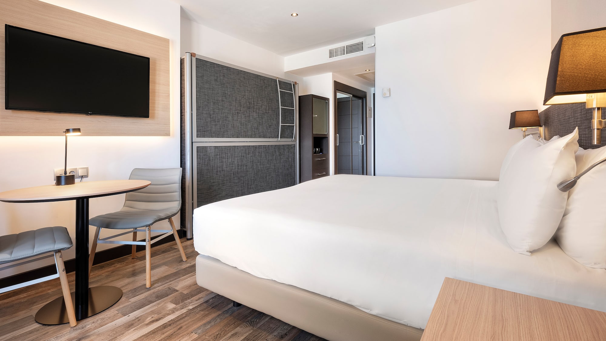 a room with a bed and a table