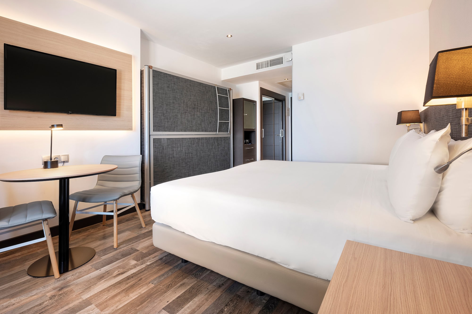 a room with a bed and a table