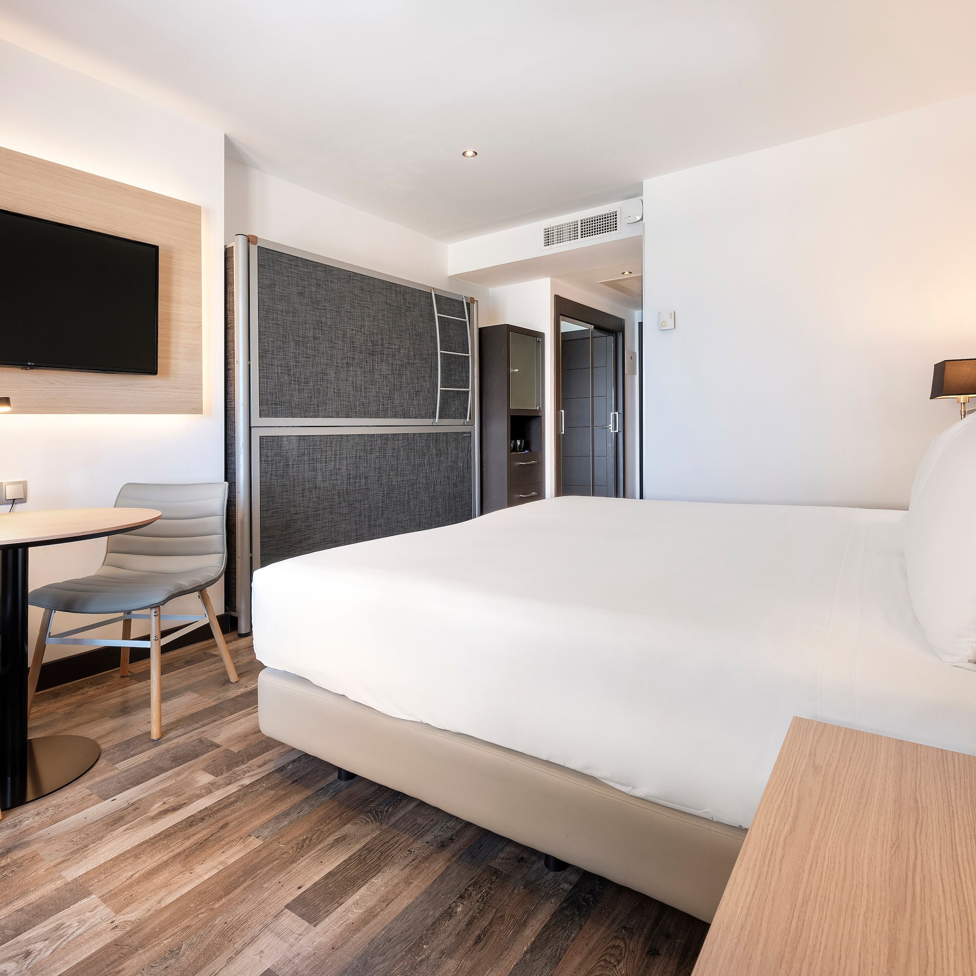 a room with a bed and a table