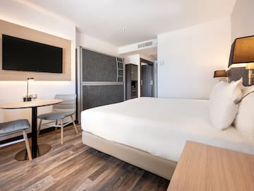 a room with a bed and a table