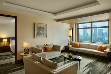 a room with couches and a table