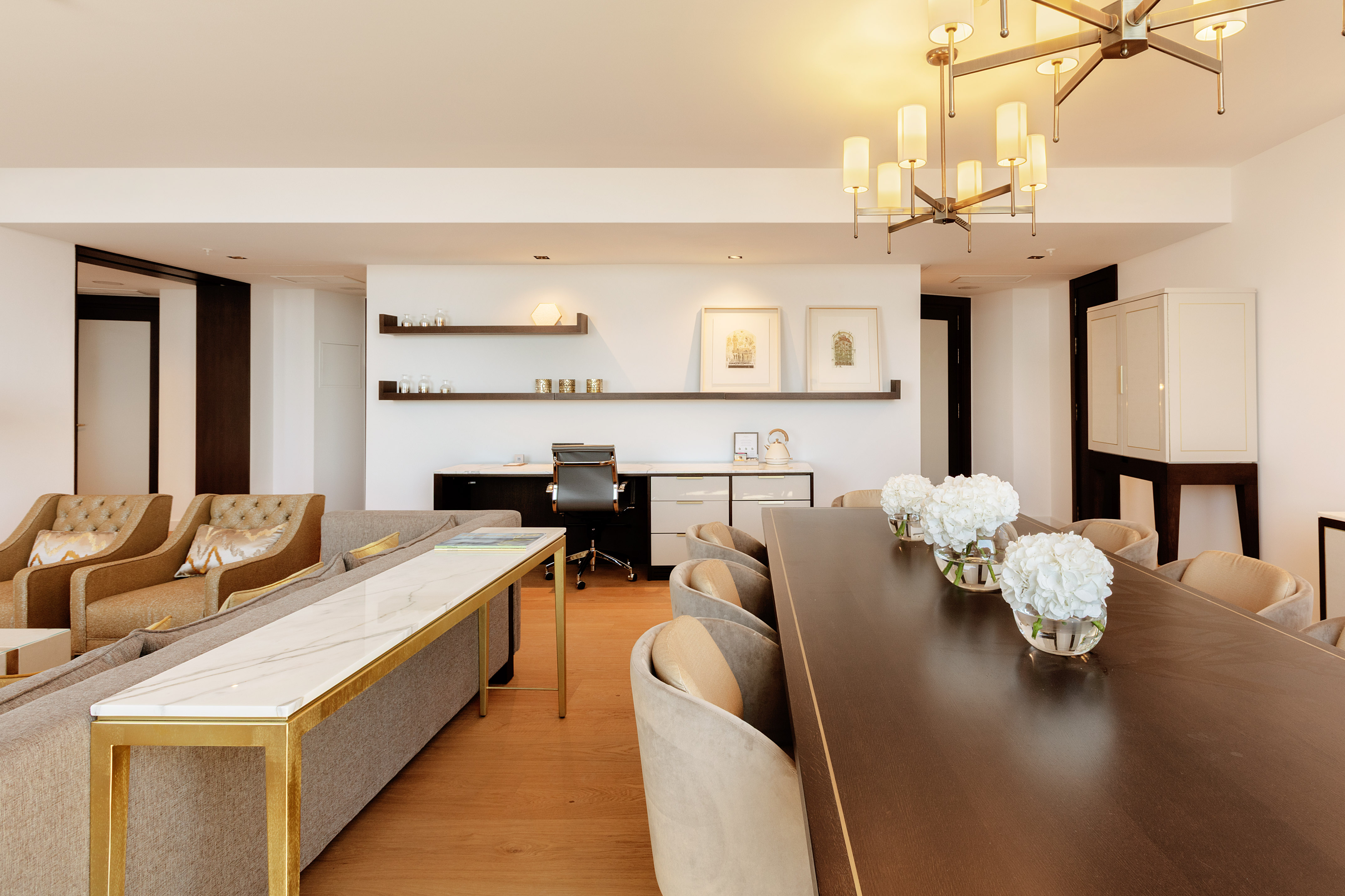 Bright modern open concept living and dining area with home office.