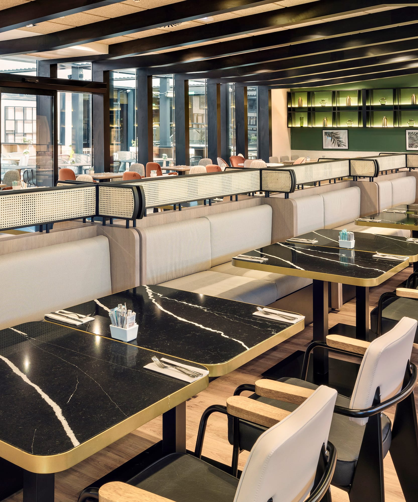 a restaurant with tables and chairs