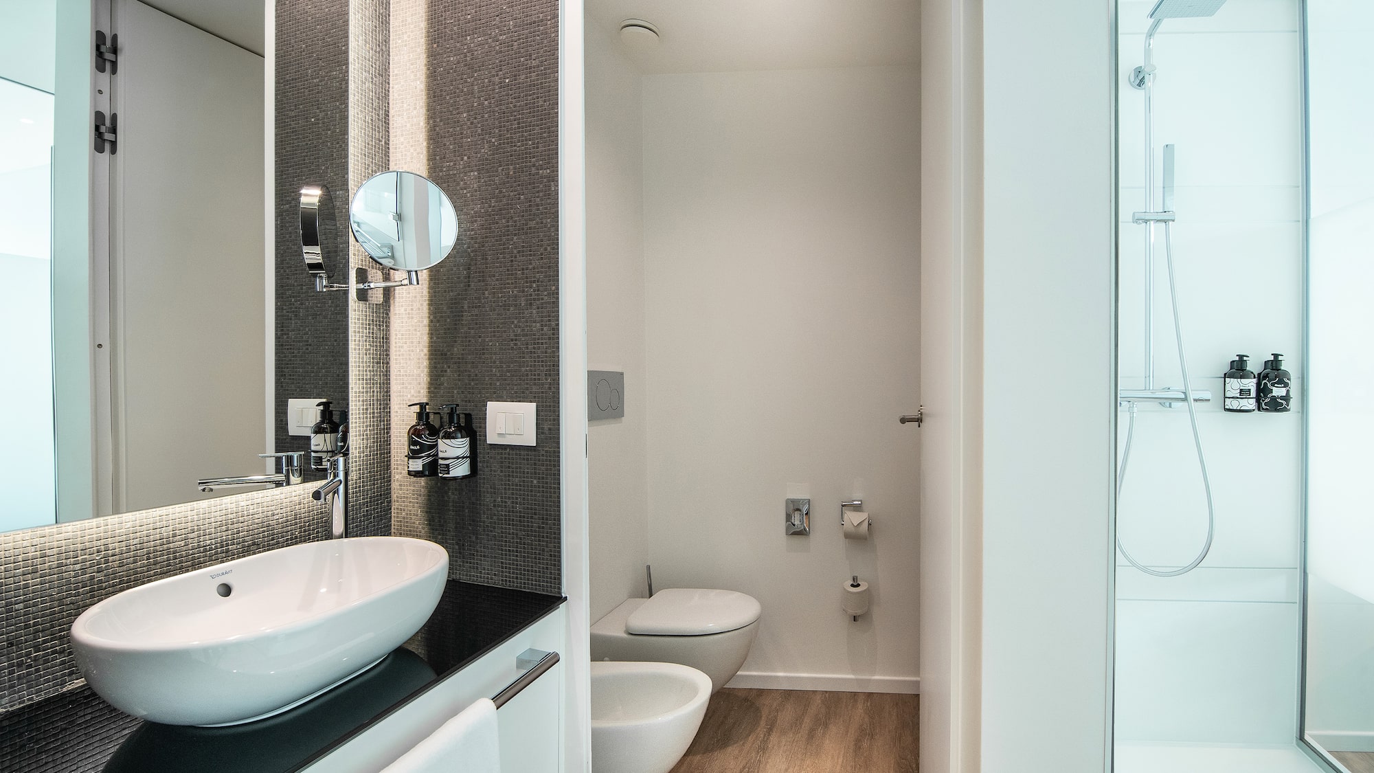 a bathroom with a toilet and sink