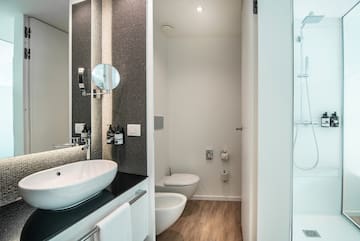 a bathroom with a toilet and sink