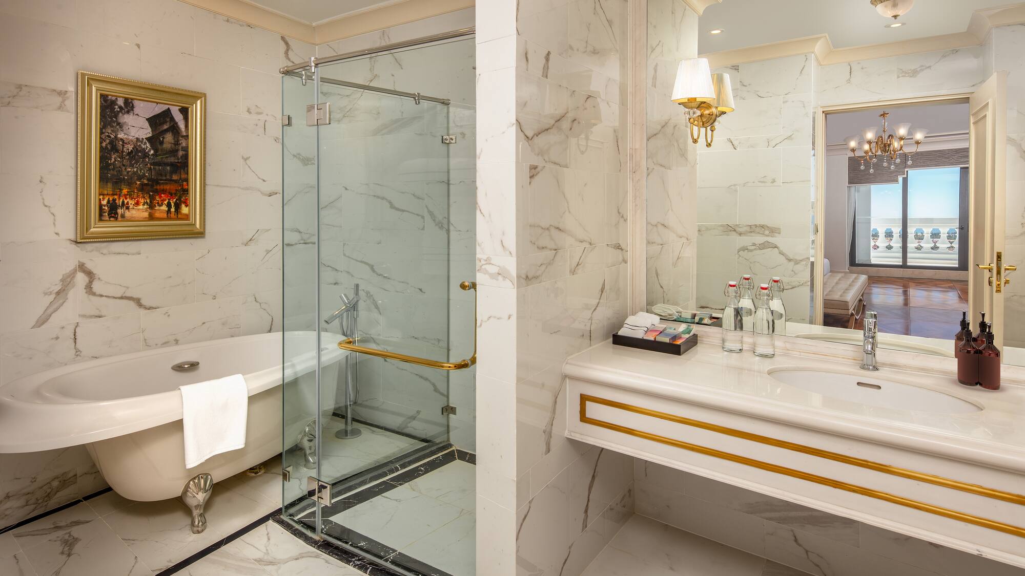 a bathroom with a glass shower and a bathtub