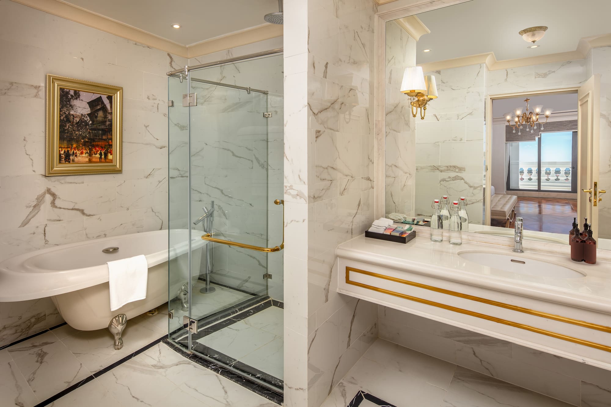 a bathroom with a glass shower and a bathtub