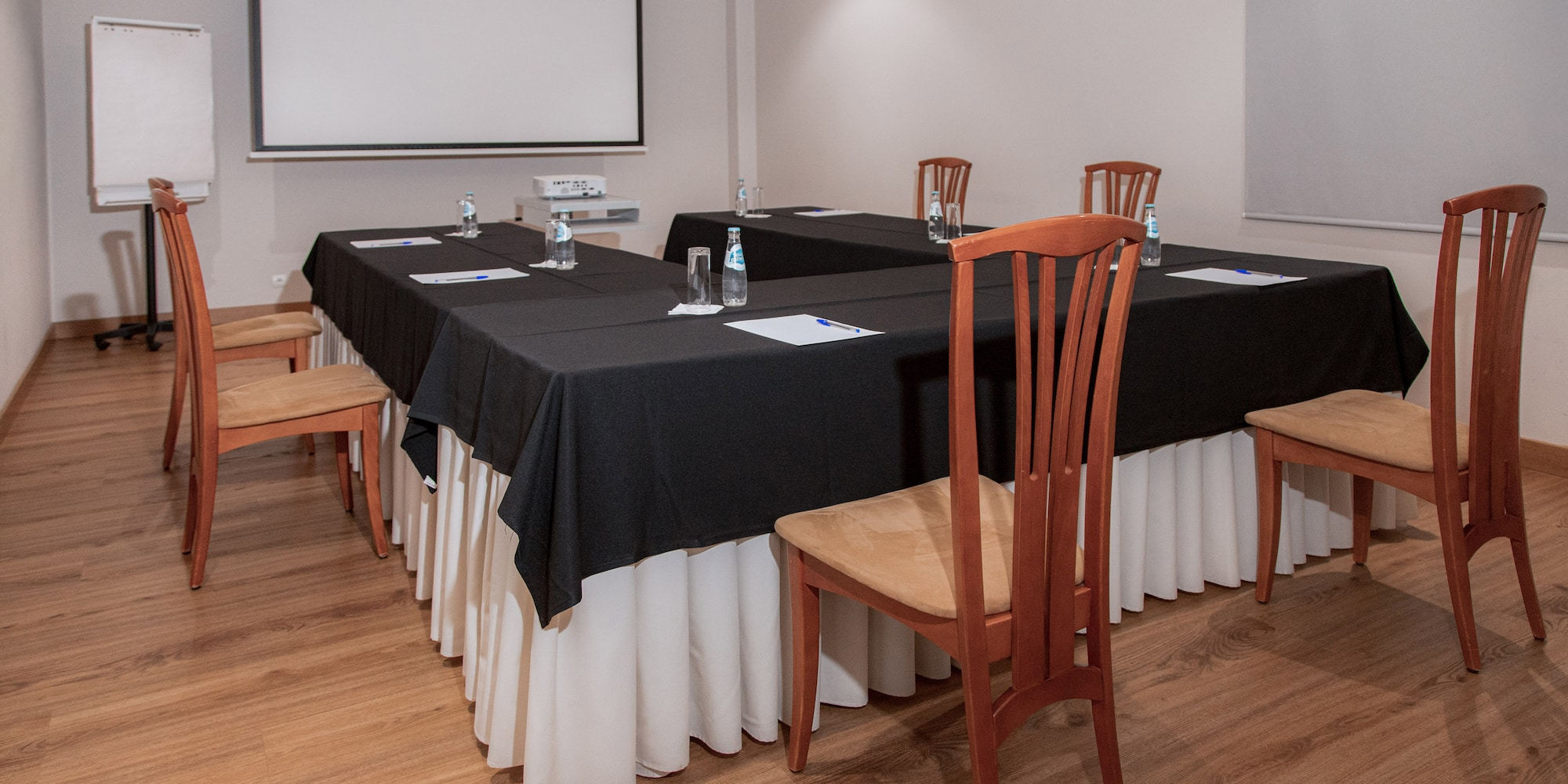 a room with a table and chairs