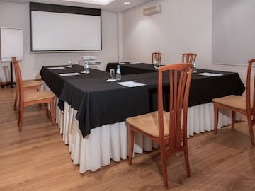 a room with a table and chairs