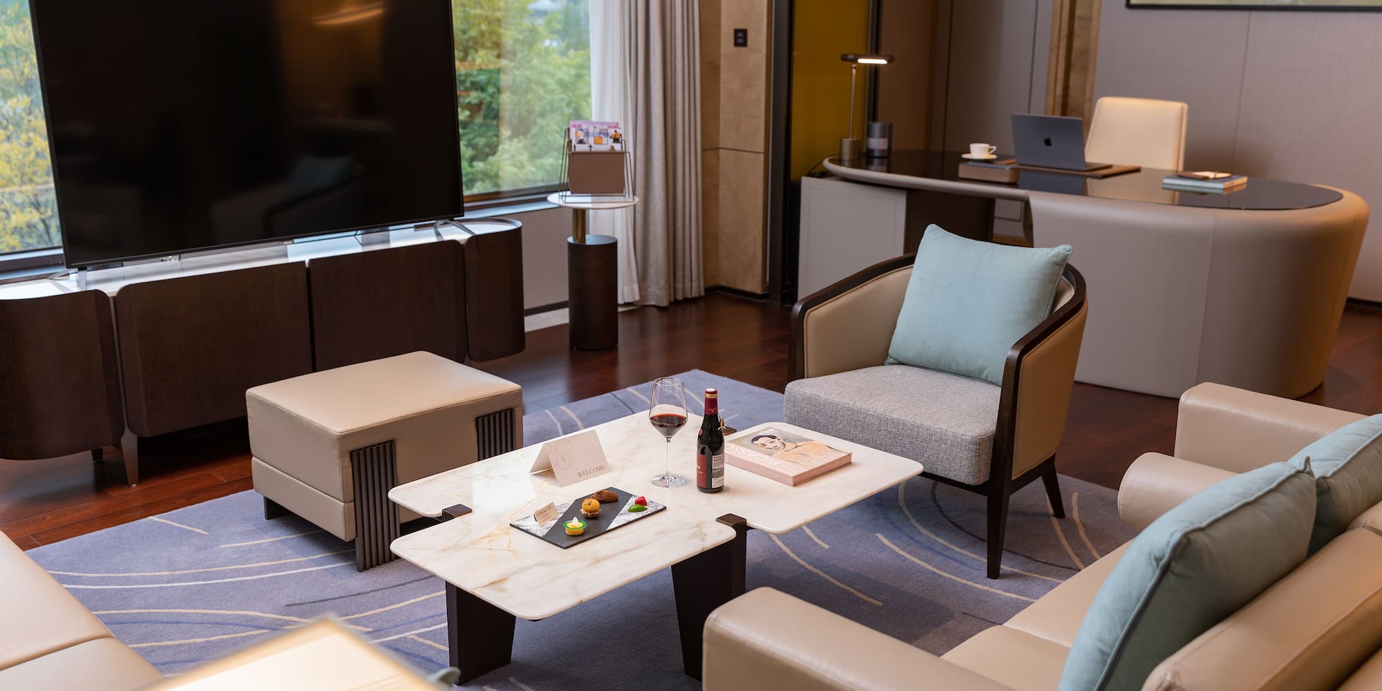 a room with a television and a table