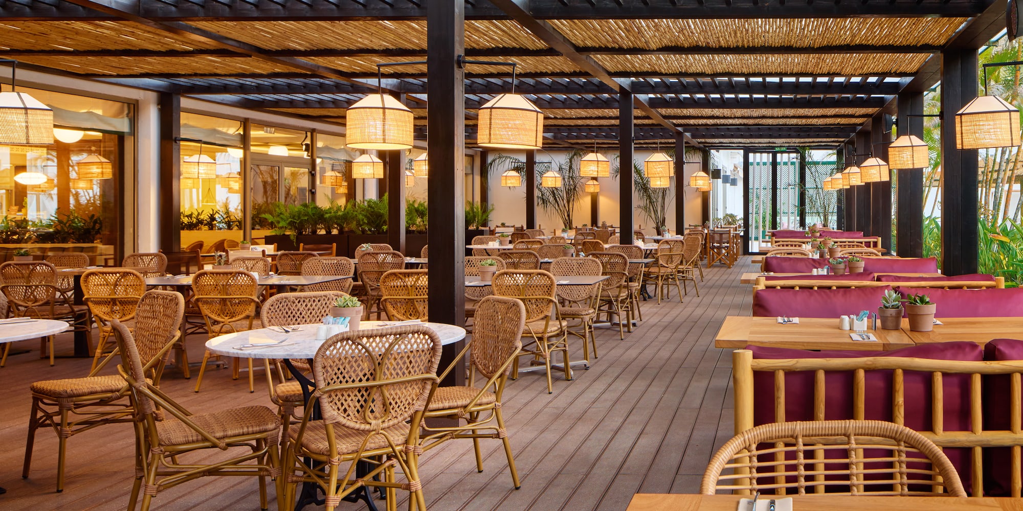 a restaurant with tables and chairs