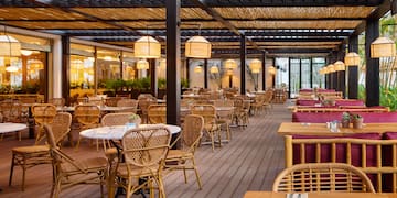 a restaurant with tables and chairs