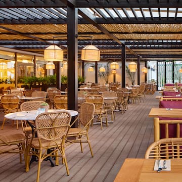 a restaurant with tables and chairs