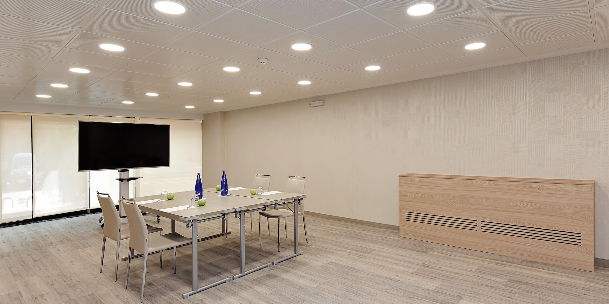 a room with a table and chairs