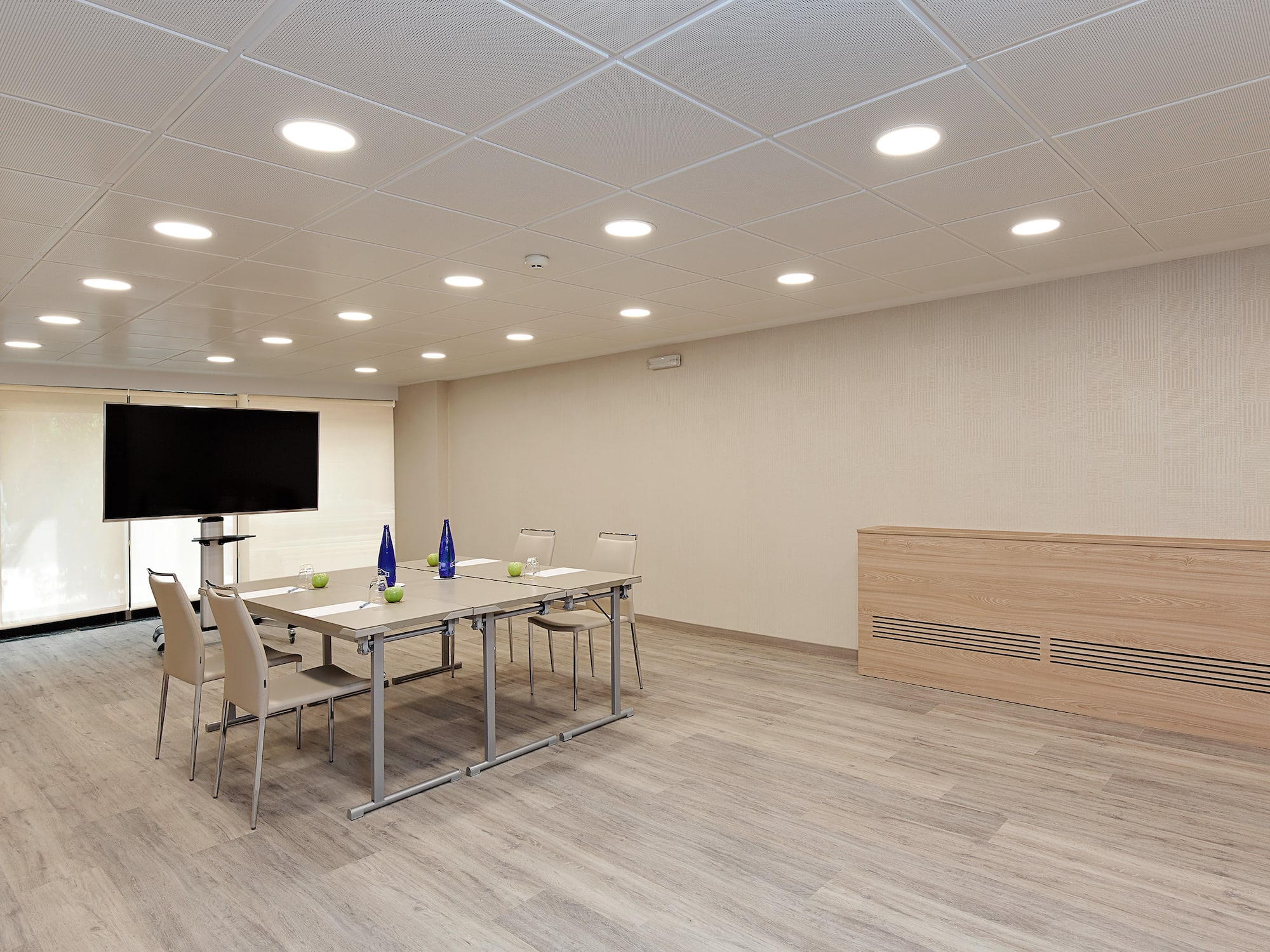 a room with a table and chairs