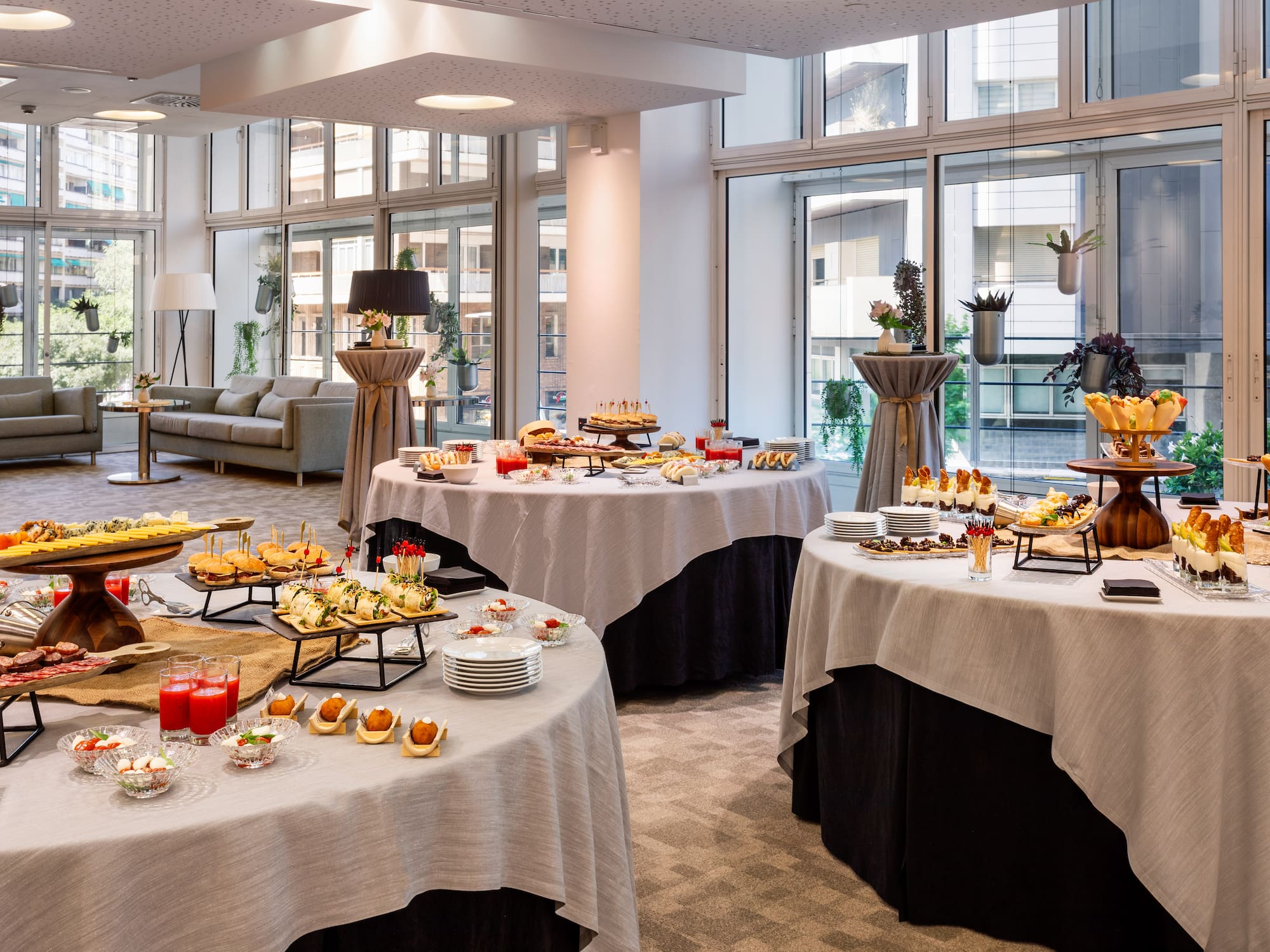 a large room with tables of food