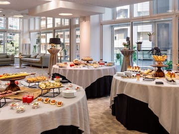 a large room with tables of food