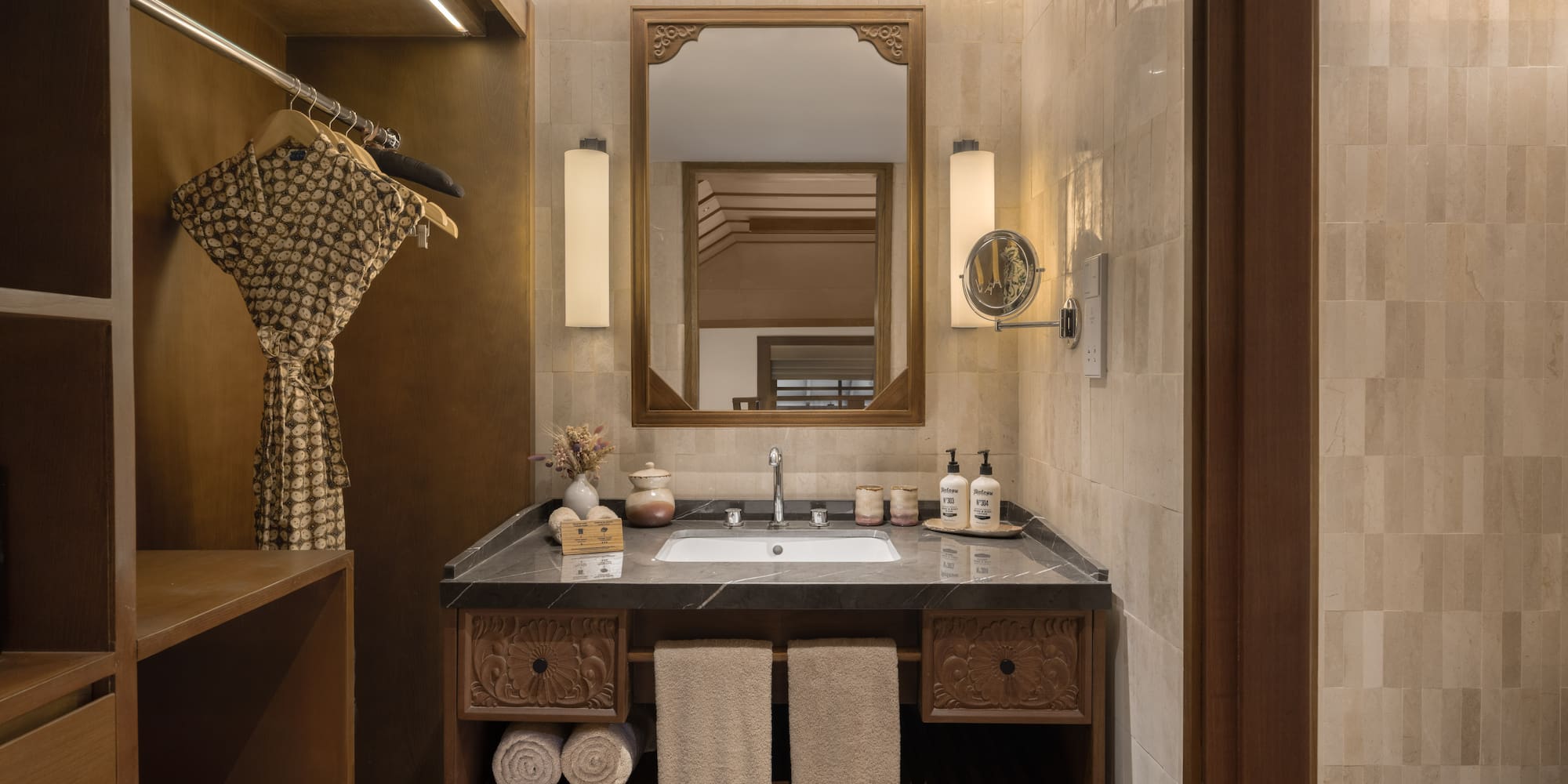 a bathroom with a mirror and sink