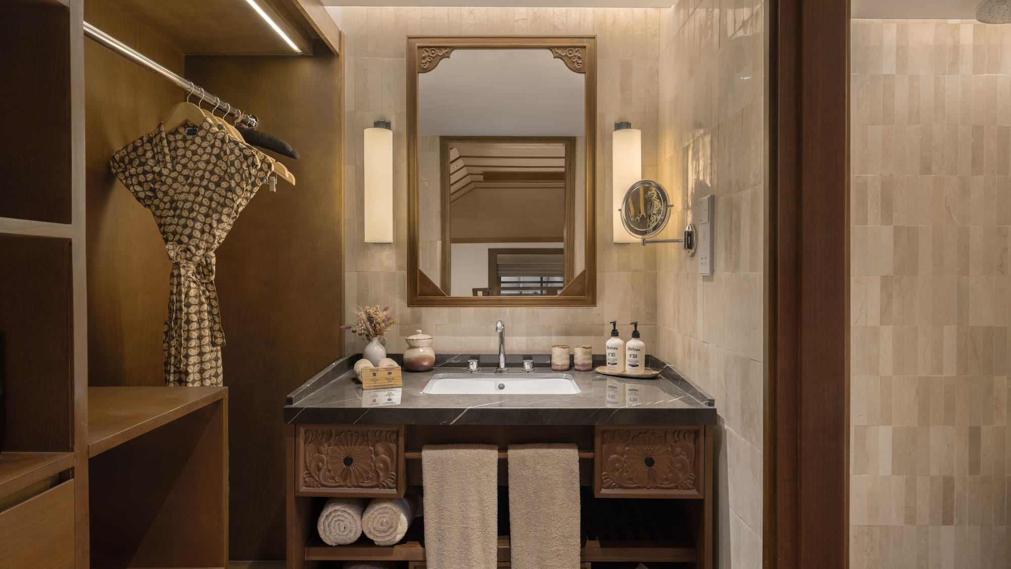 a bathroom with a mirror and sink