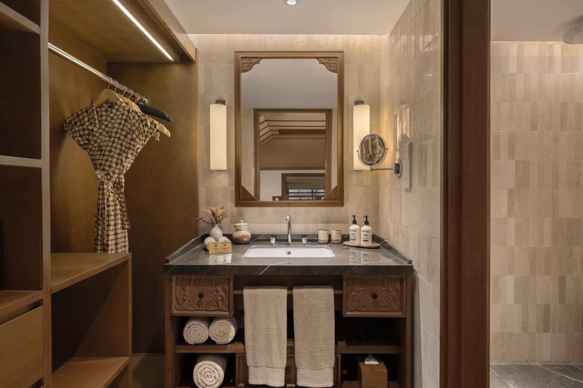 a bathroom with a mirror and sink