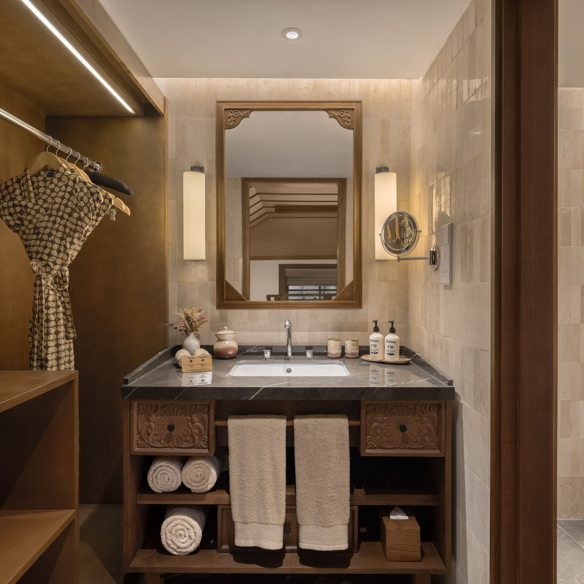 a bathroom with a mirror and sink