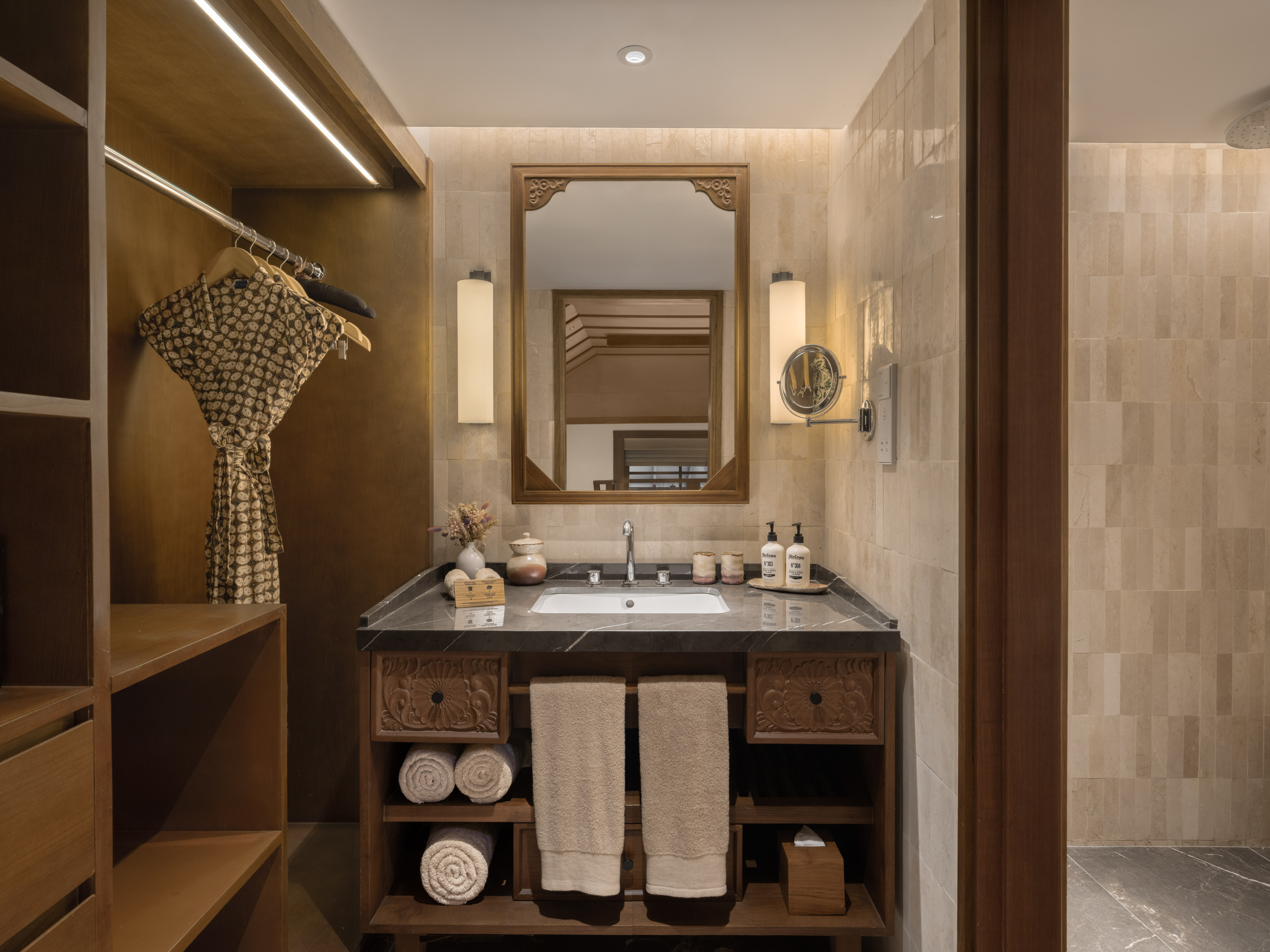 a bathroom with a mirror and sink