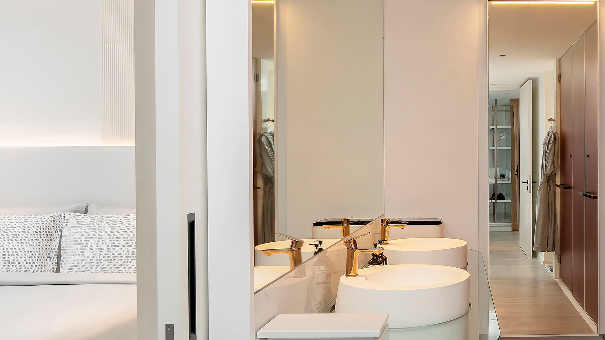 a bathroom with a double sink and a mirror