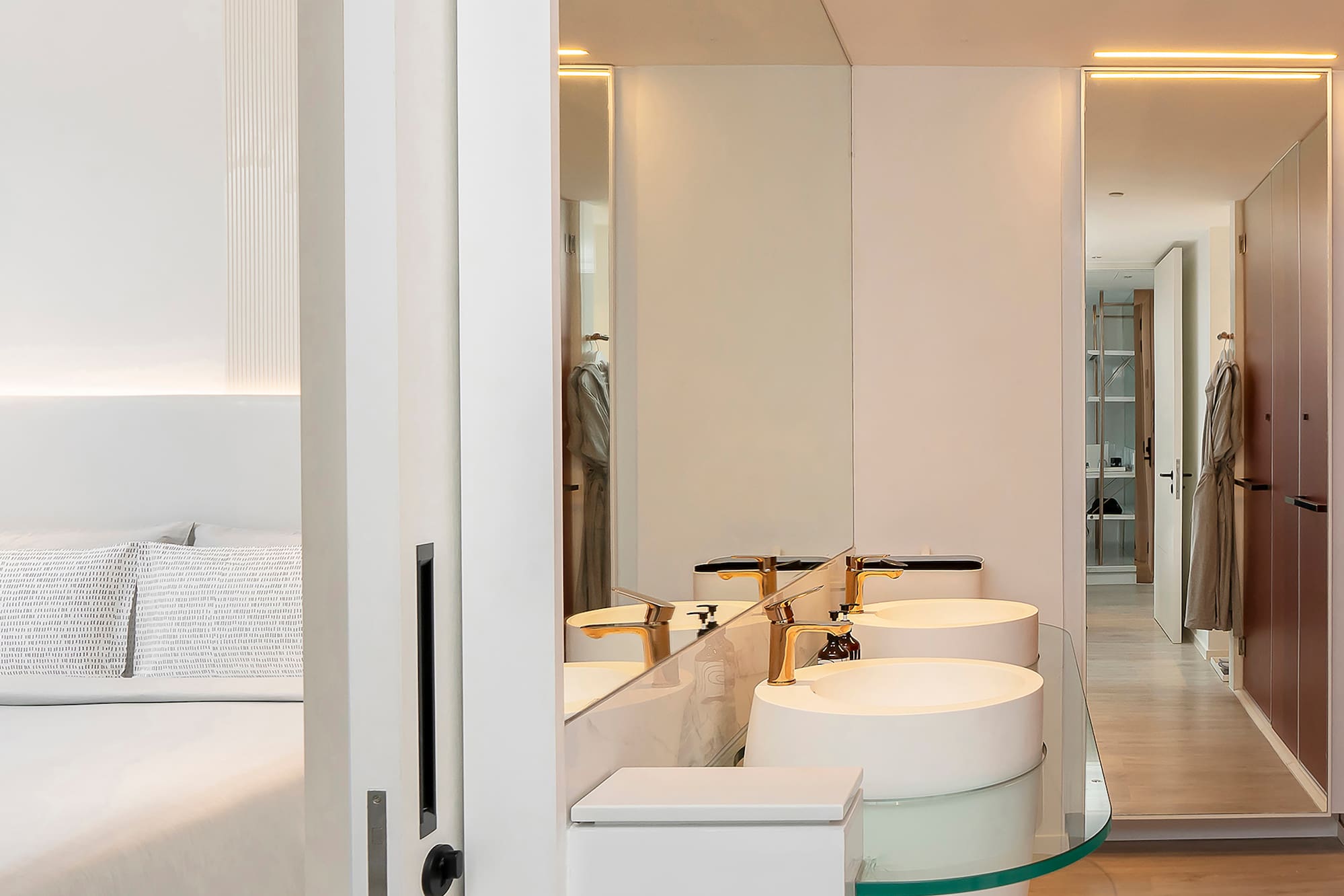 a bathroom with a double sink and a mirror