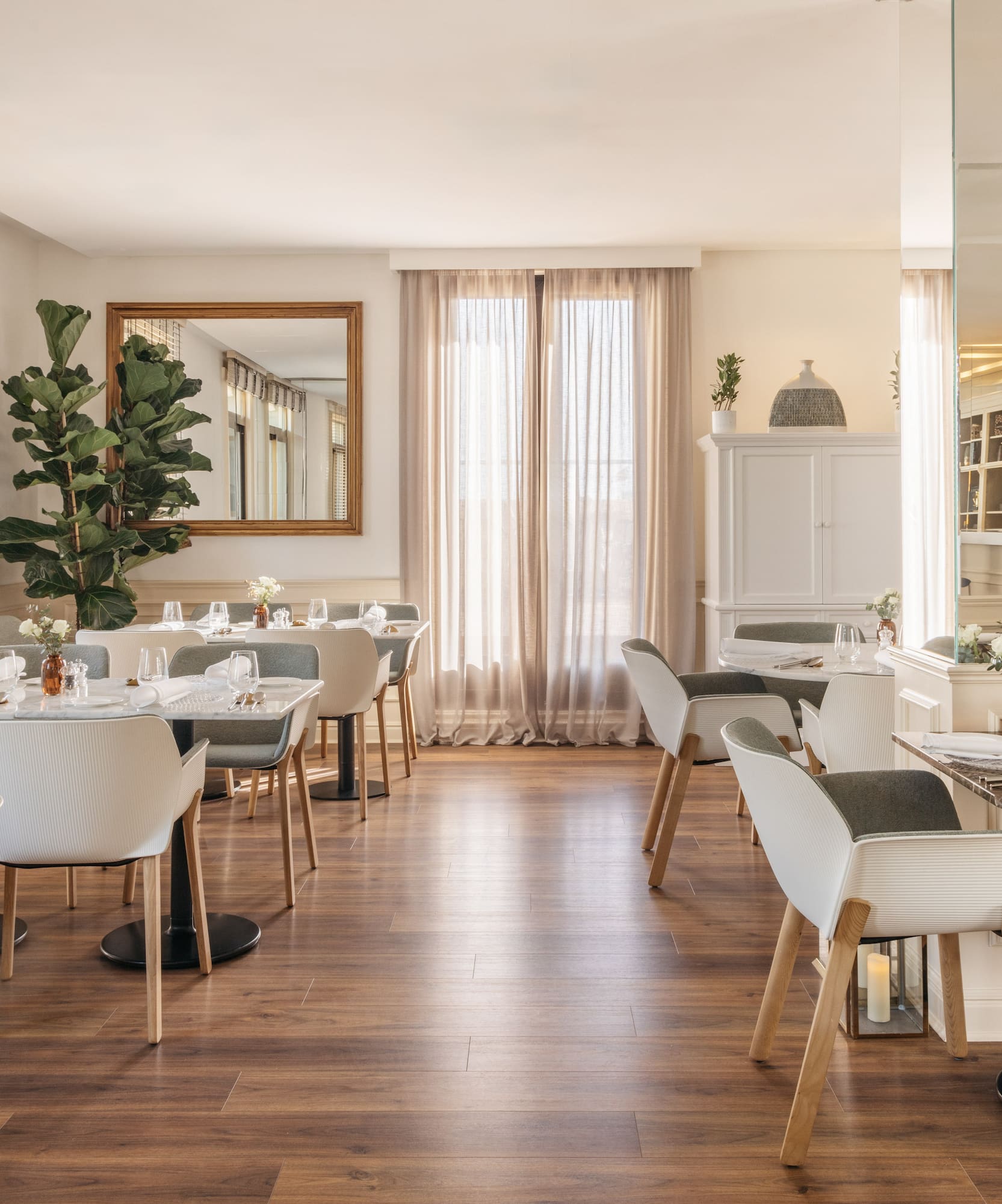 a room with tables and chairs