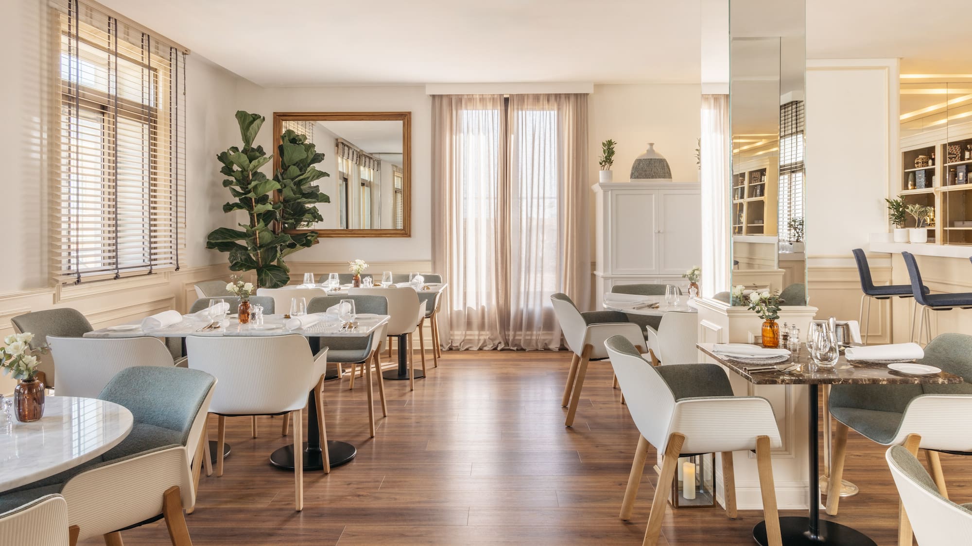 a room with tables and chairs