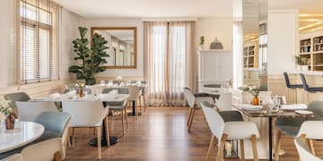 a room with tables and chairs