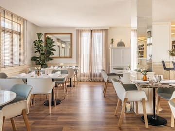 a room with tables and chairs