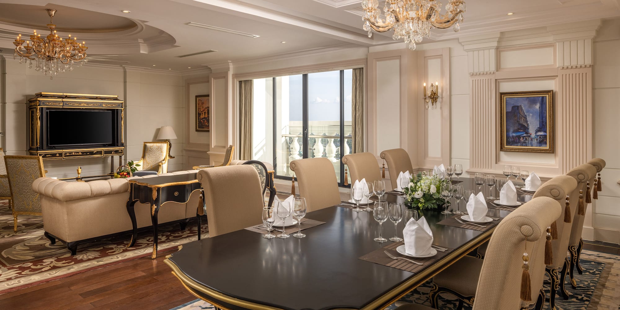 a room with a large table and chairs